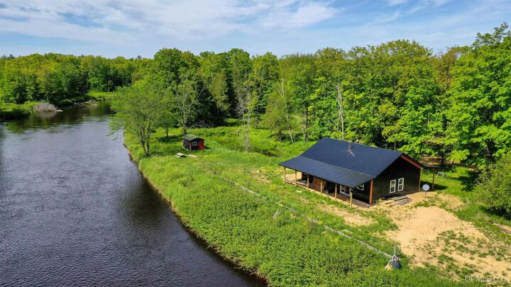 Property Photo:  4403 N River Road  MI 49840 