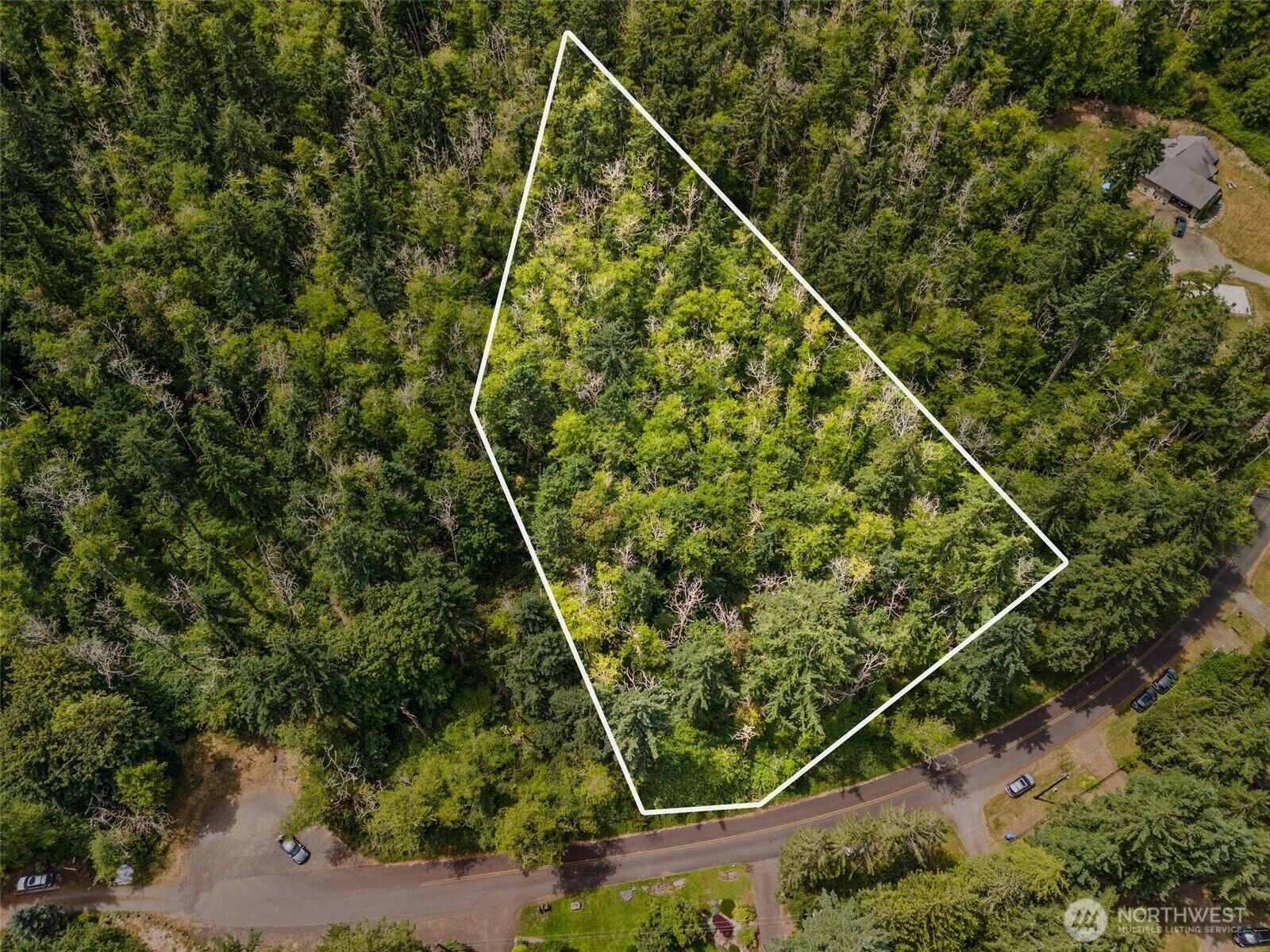 Property Photo:  7605  Sandy Point Beach Road NE  WA 98516 