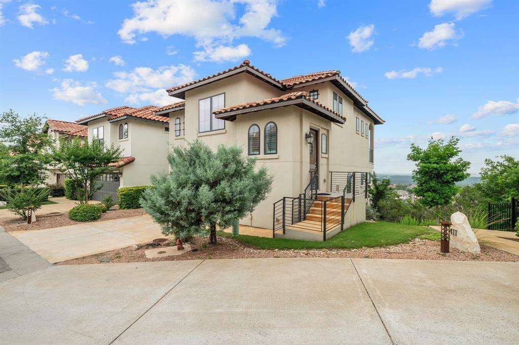 Property Photo: 409 Rose Branch Way 21 TX 78738