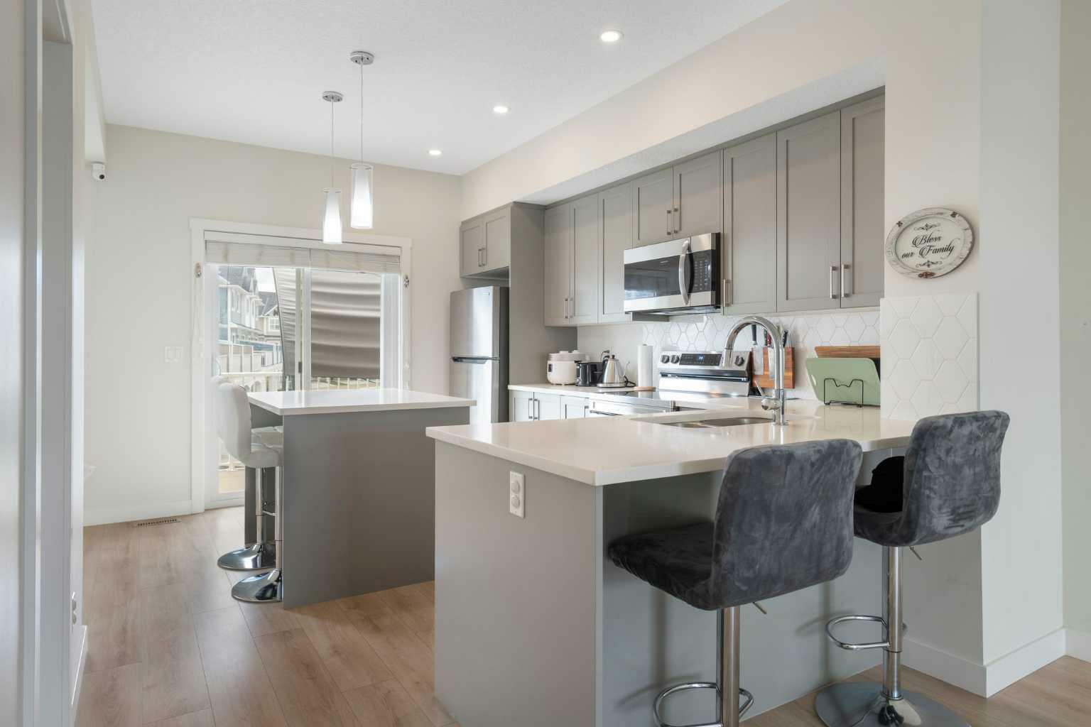 Property Photo: 240 Copperleaf Way SE AB T2Z 5G2