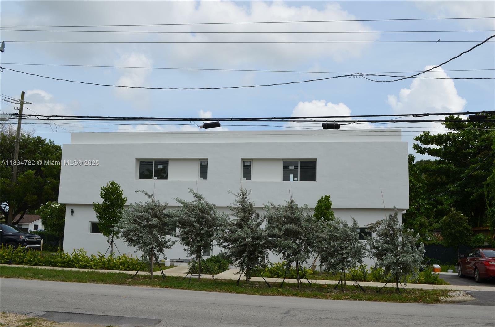 Property Photo: 1998 NW 50th St FL 33142