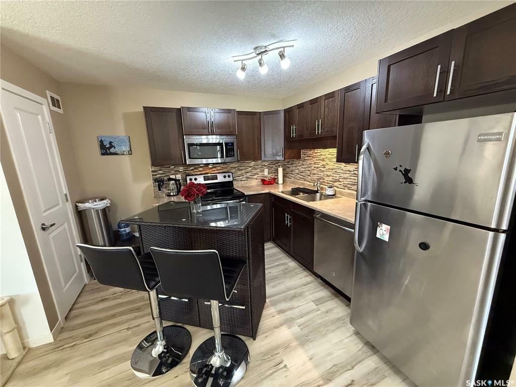 Property Photo: 5541 Blake Crescent 42 SK S4X 0J1