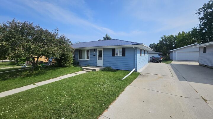Property Photo:  1319 Greenfield Ave  WI 53081 
