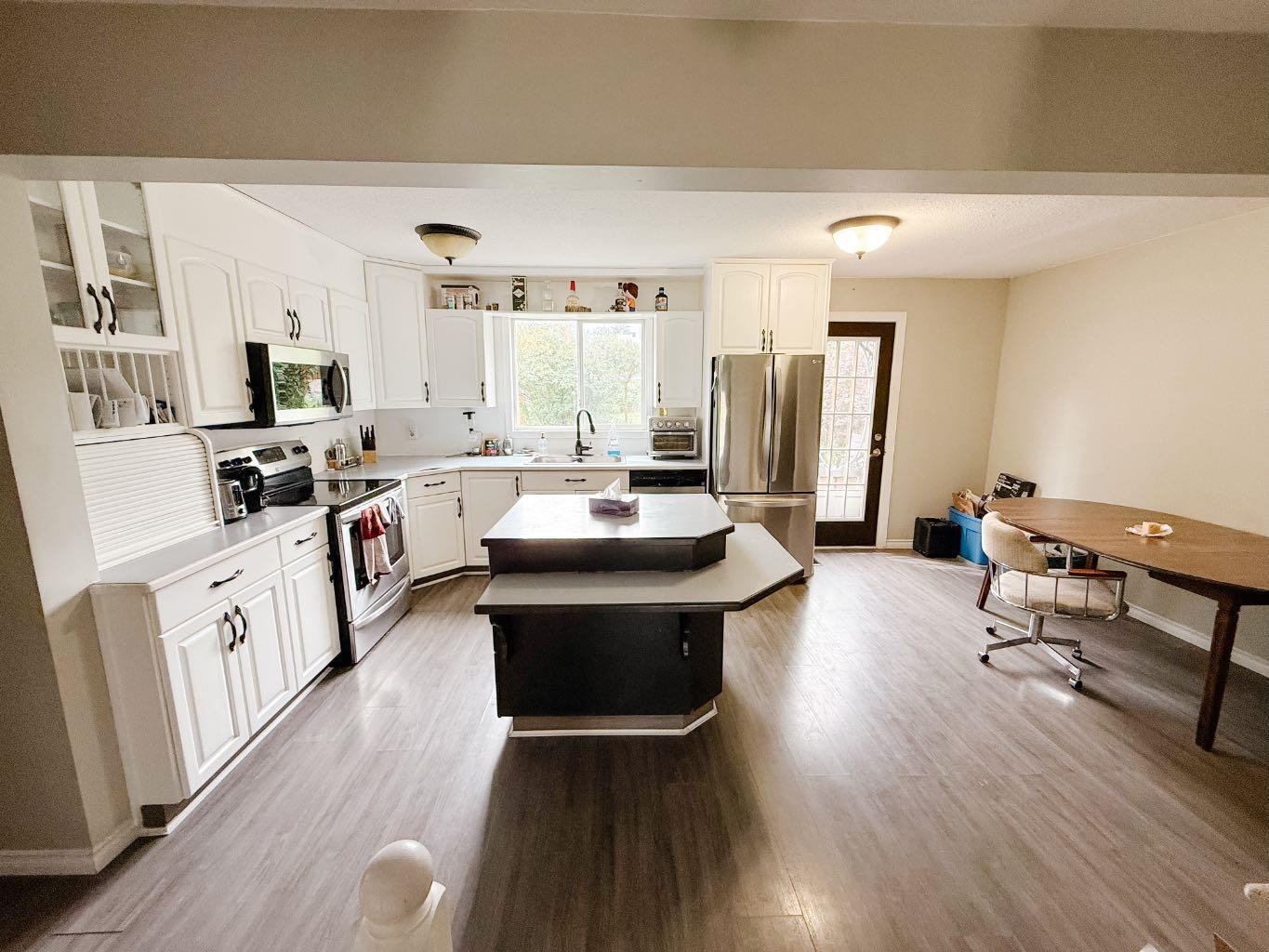 Property Photo: 5734 53 Street Close AB T4T 1M6