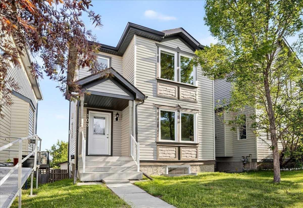 Property Photo: 103 Covemeadow Road NE AB T3K 6E9
