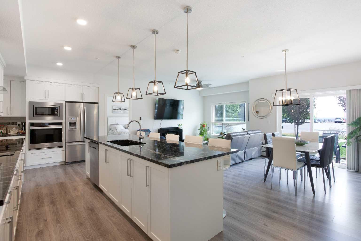Property Photo:  4250 Seton Drive SE 110  AB T3M 3B7 