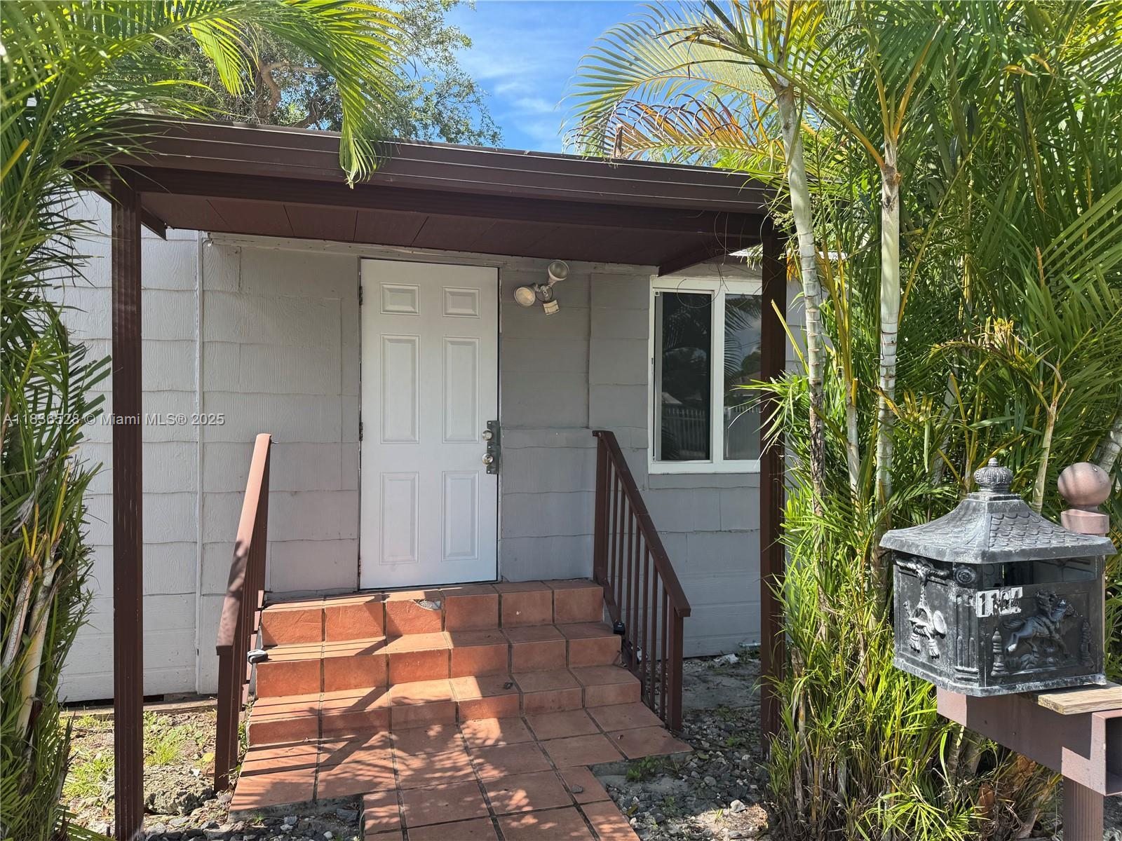Property Photo: 1104 NW 64th St FL 33150