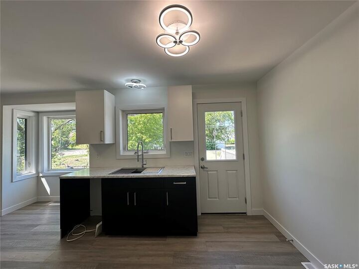 Property Photo:  303 2nd Street NE  SK S0K 4V0 