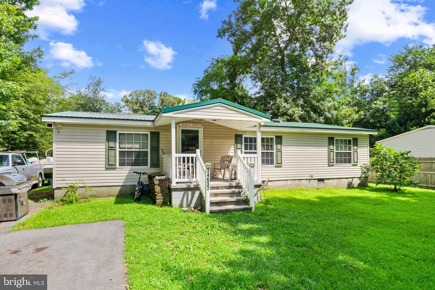 Property Photo:  34637 Nottingham Way  DE 19945 