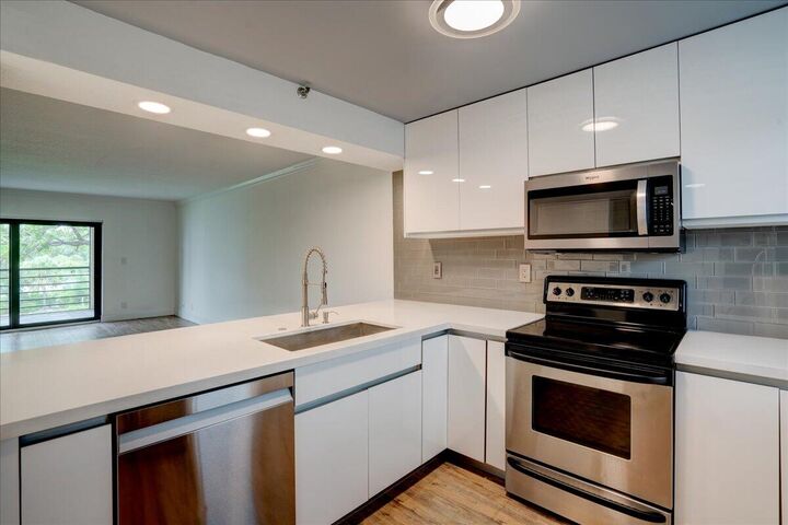 Property Photo:  9235 SW 8th Street 307  FL 33428 