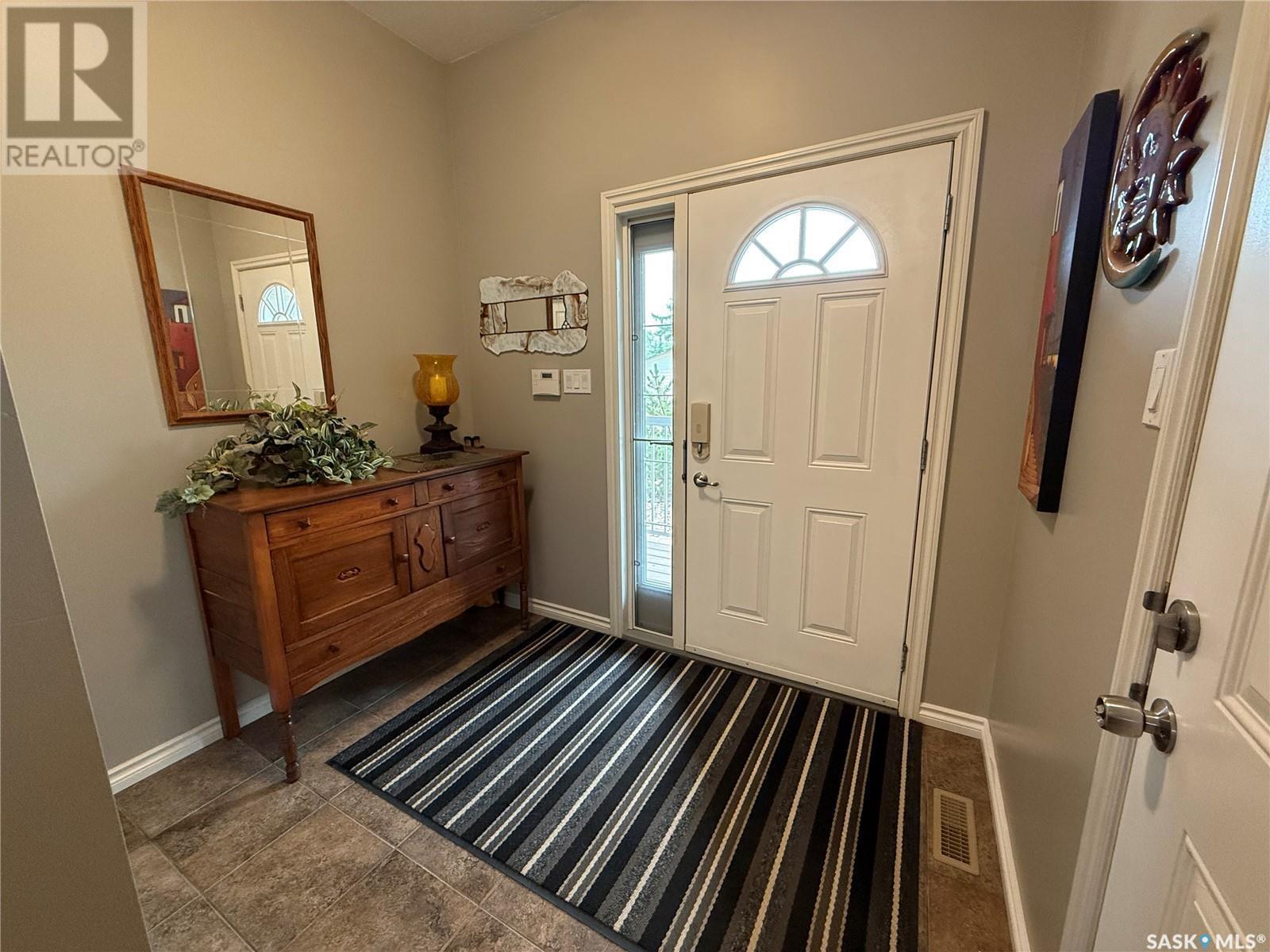 Property Photo:  #2 708 Macdonald Street W  SK S6H 2W2 