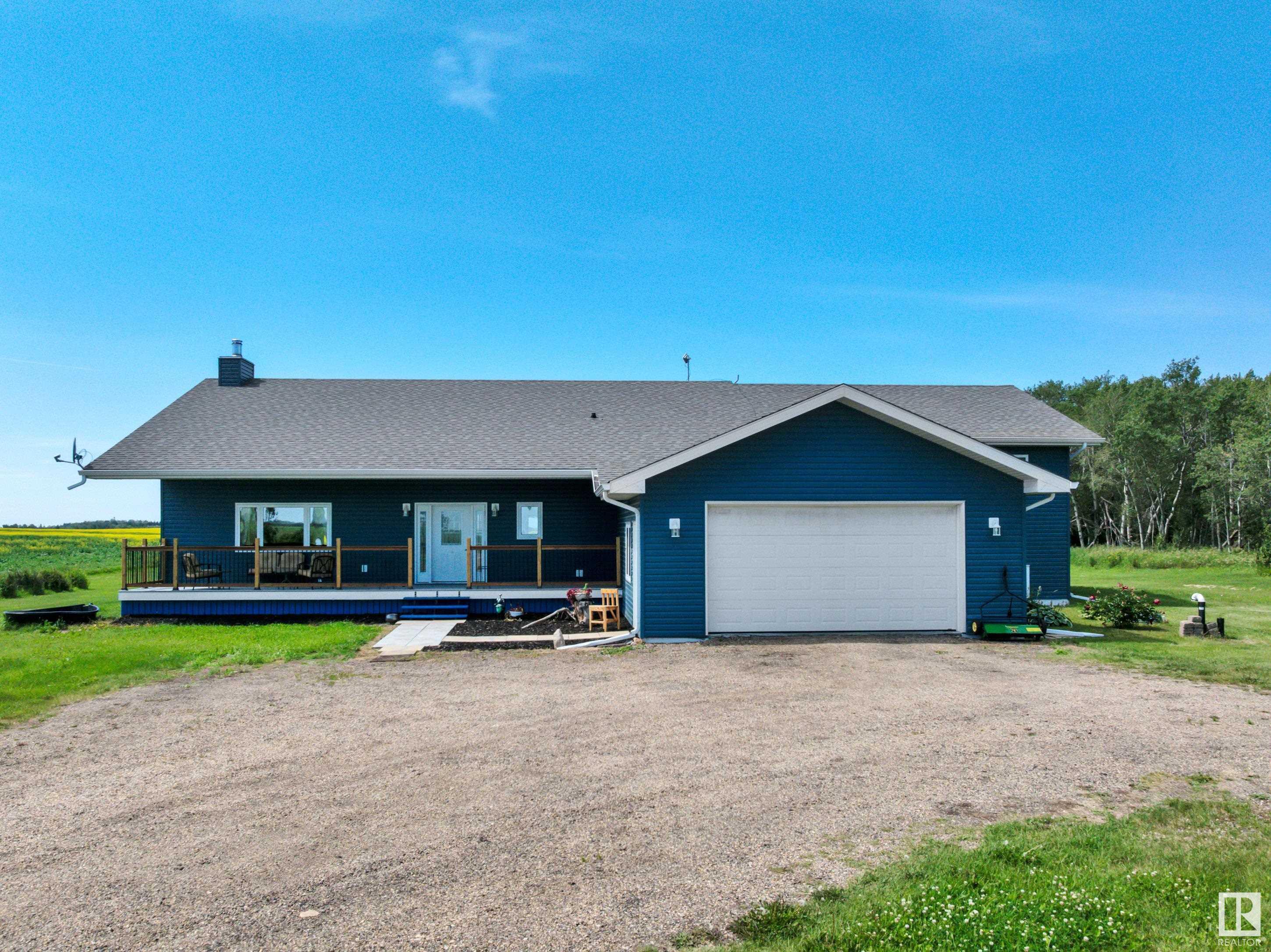 Property Photo: 56032 Rge Road 241 AB T0A 0K0