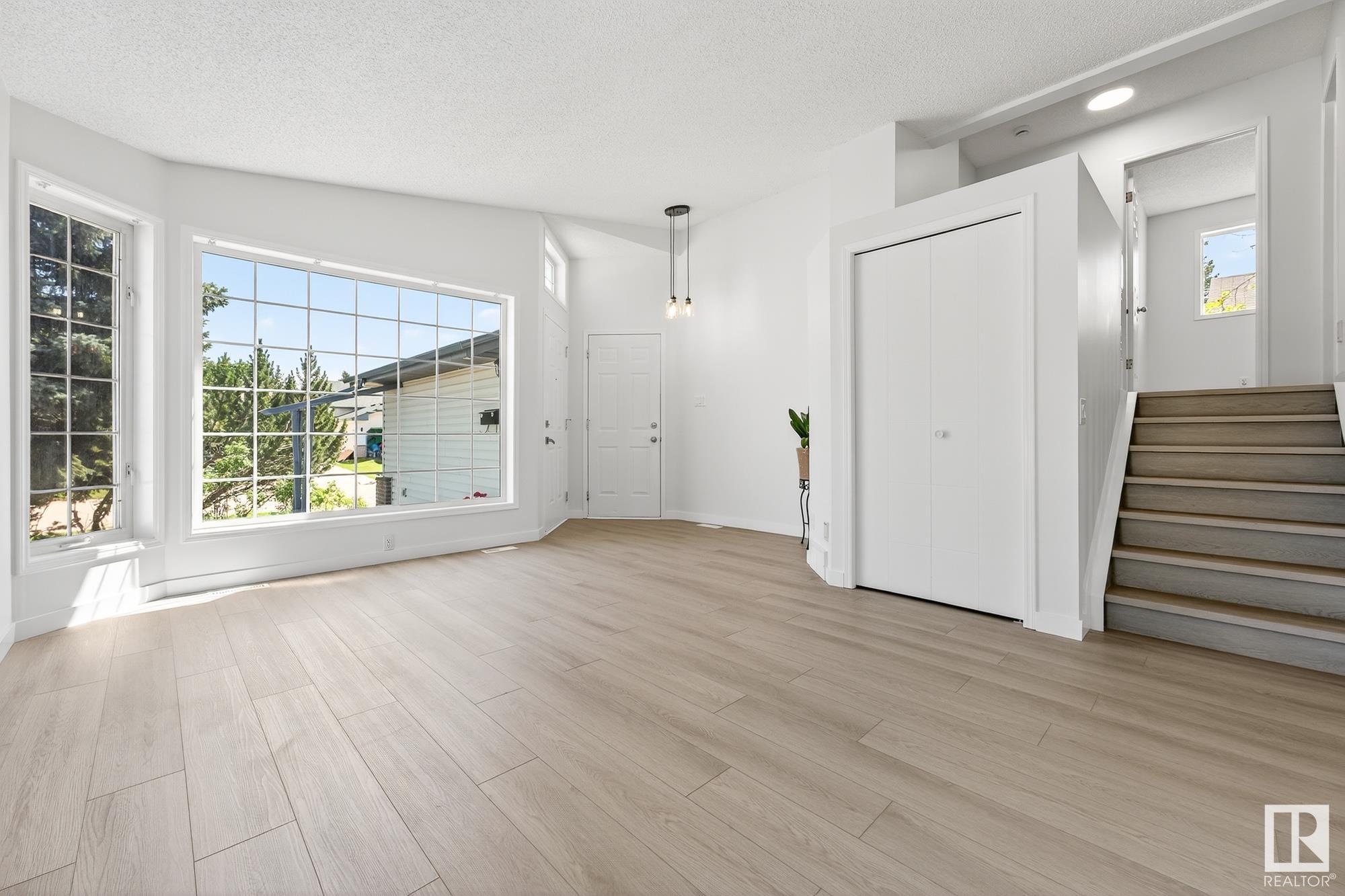 Property Photo:  11453 9 Avenue NW  AB T6J 6X8 
