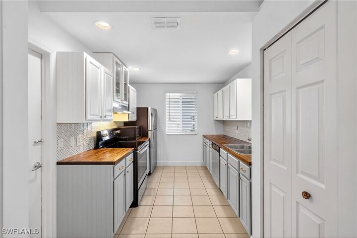Property Photo:  11817 Forest Mere Drive  FL 34135 