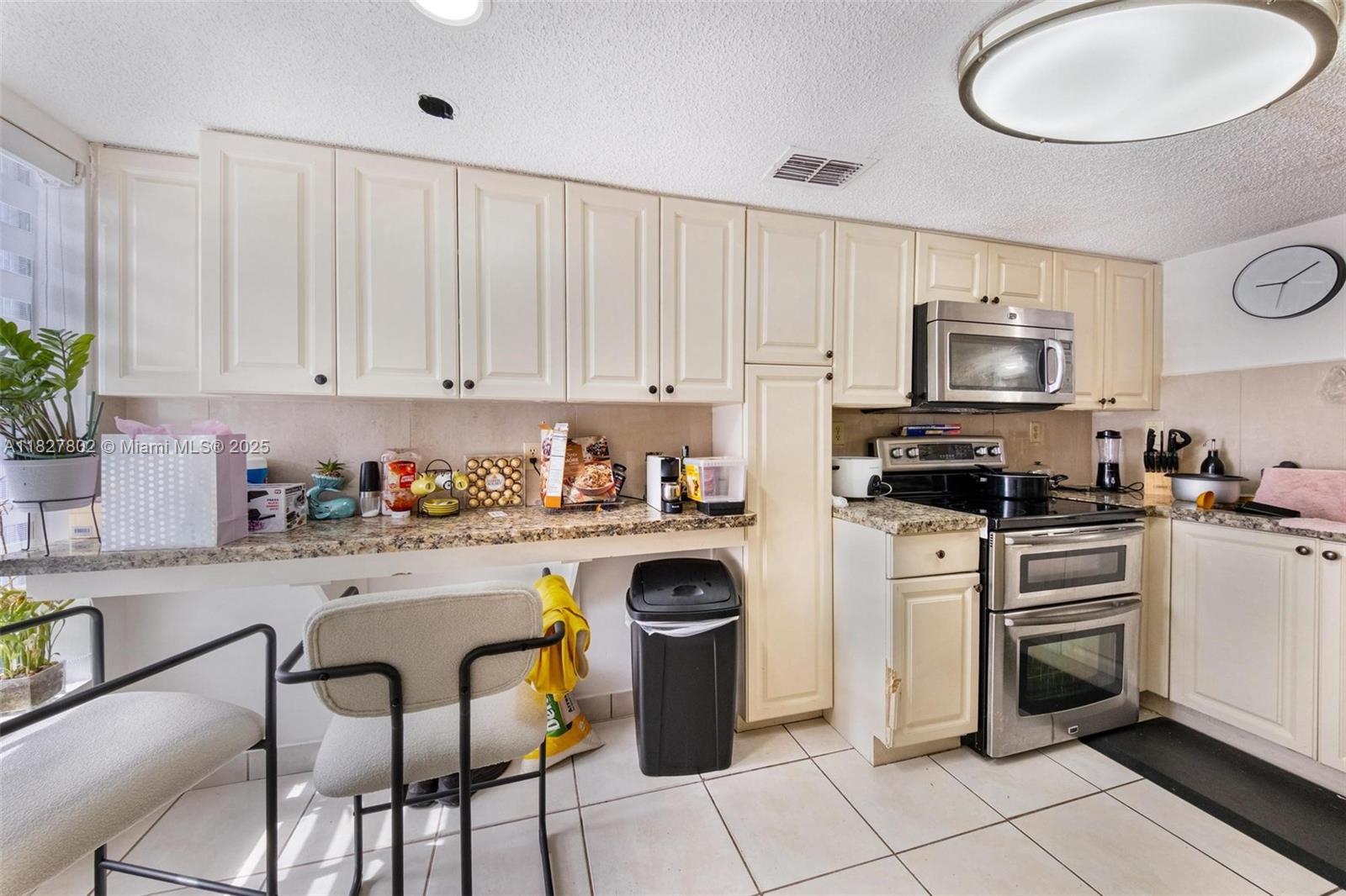 Property Photo:  1178 NW 123rd Pl 1210  FL 33182 