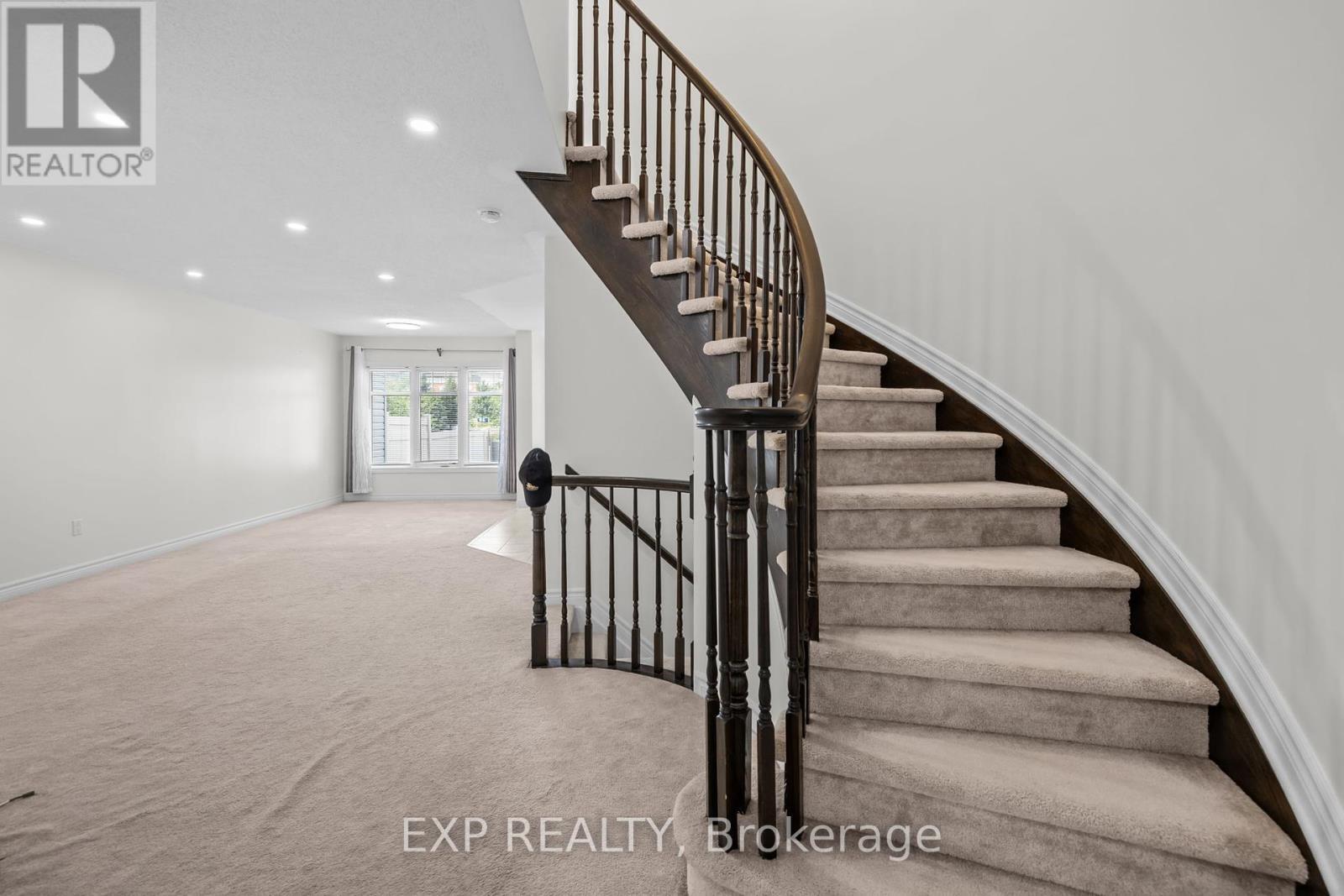 Property Photo: 213 Mancini Way ON K2J 3V1