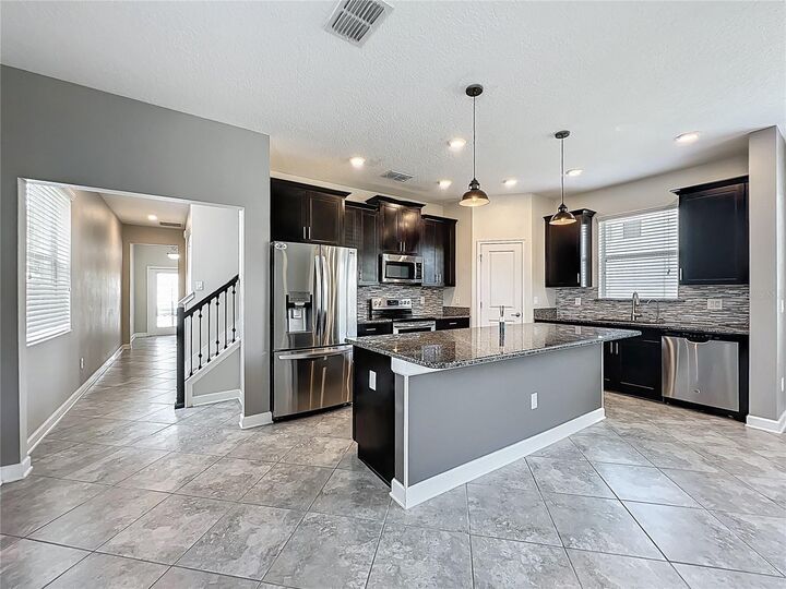 Property Photo:  10182 Authors Way  FL 32832 