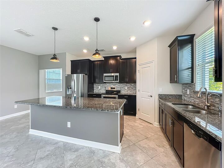 Property Photo:  10182 Authors Way  FL 32832 