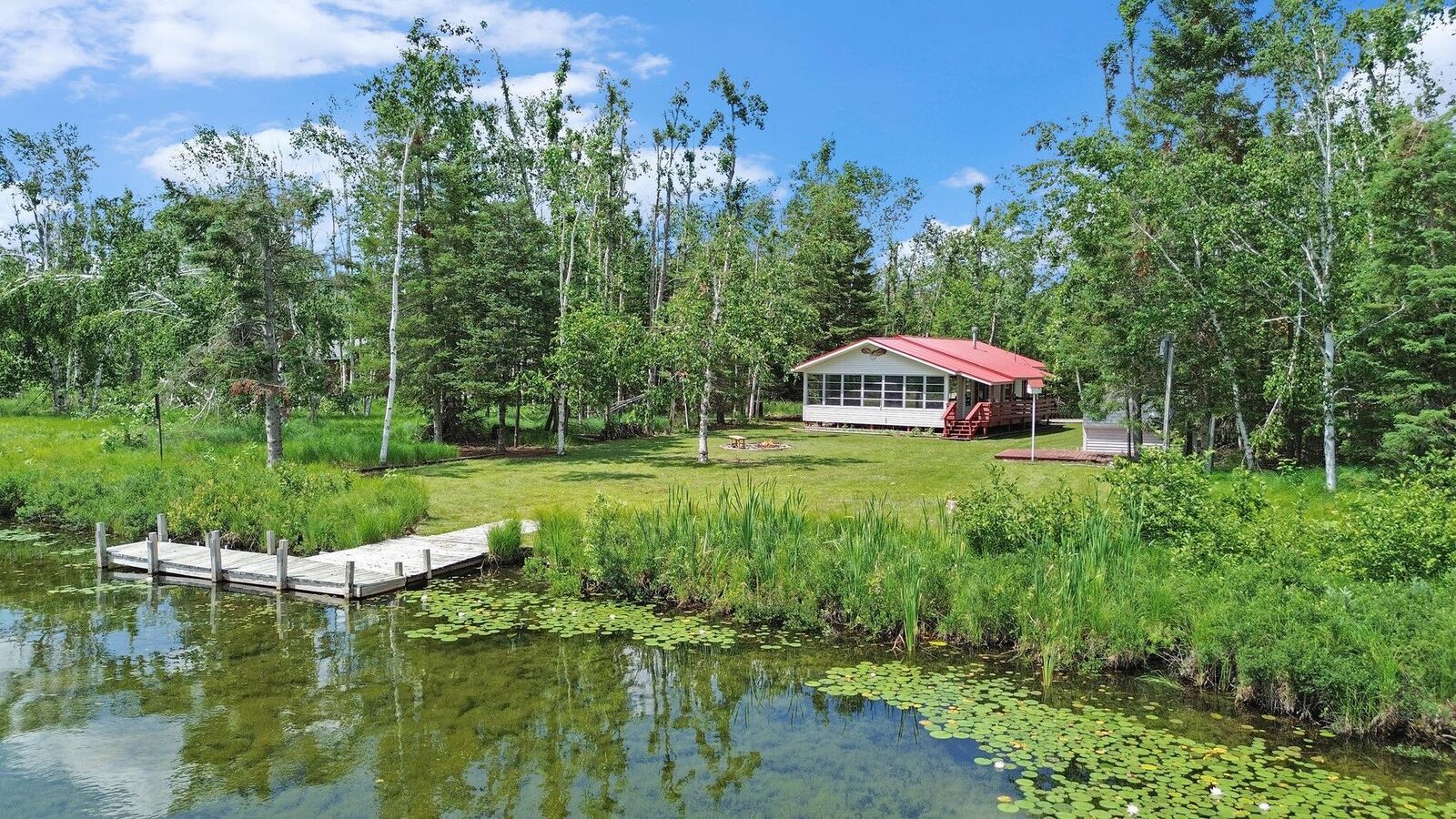 Property Photo: 8717 Caulkins Lake Road MI 49751