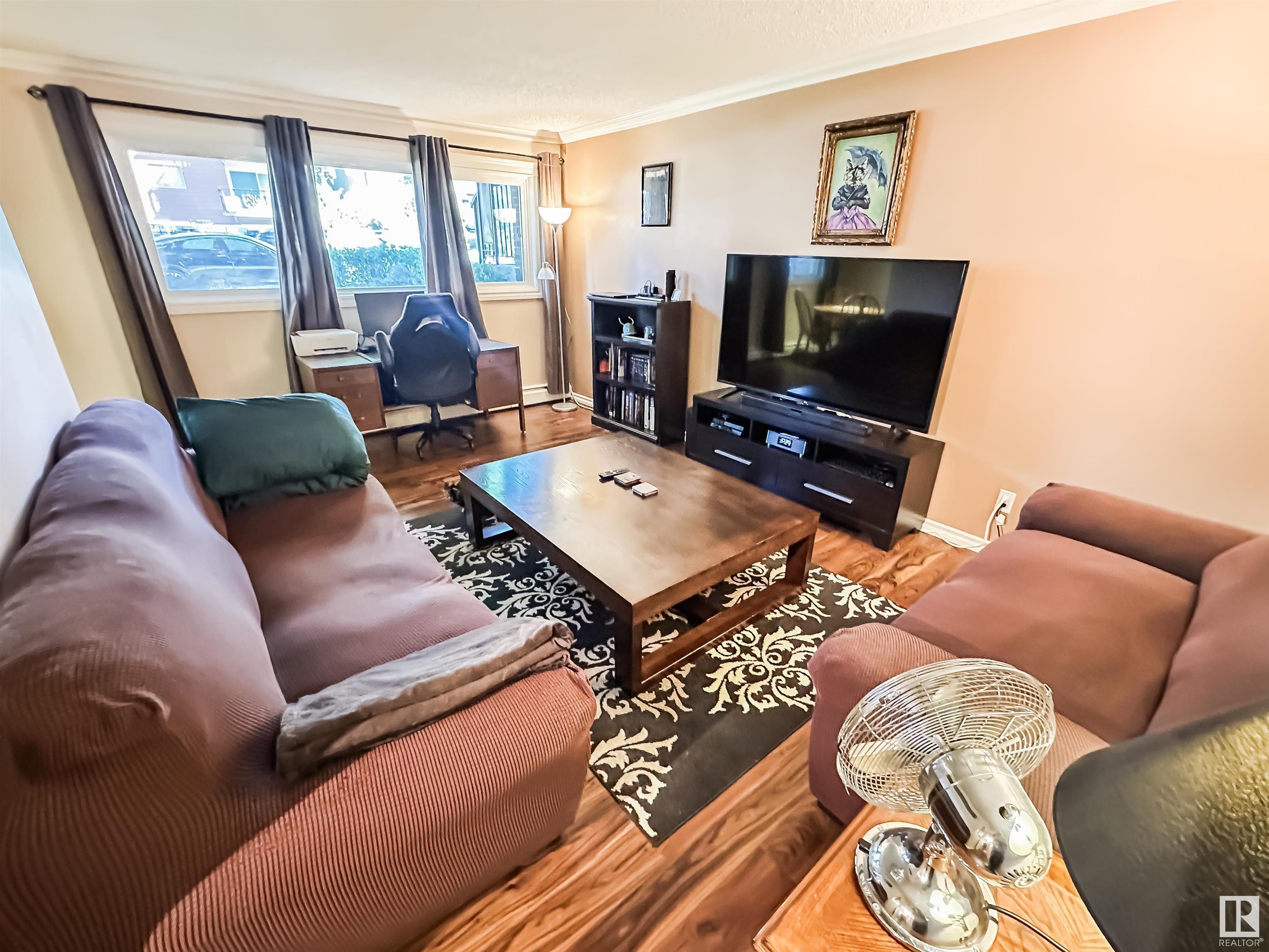 Property Photo:  10555 83 Avenue NW 101  AB T6E 2E1 