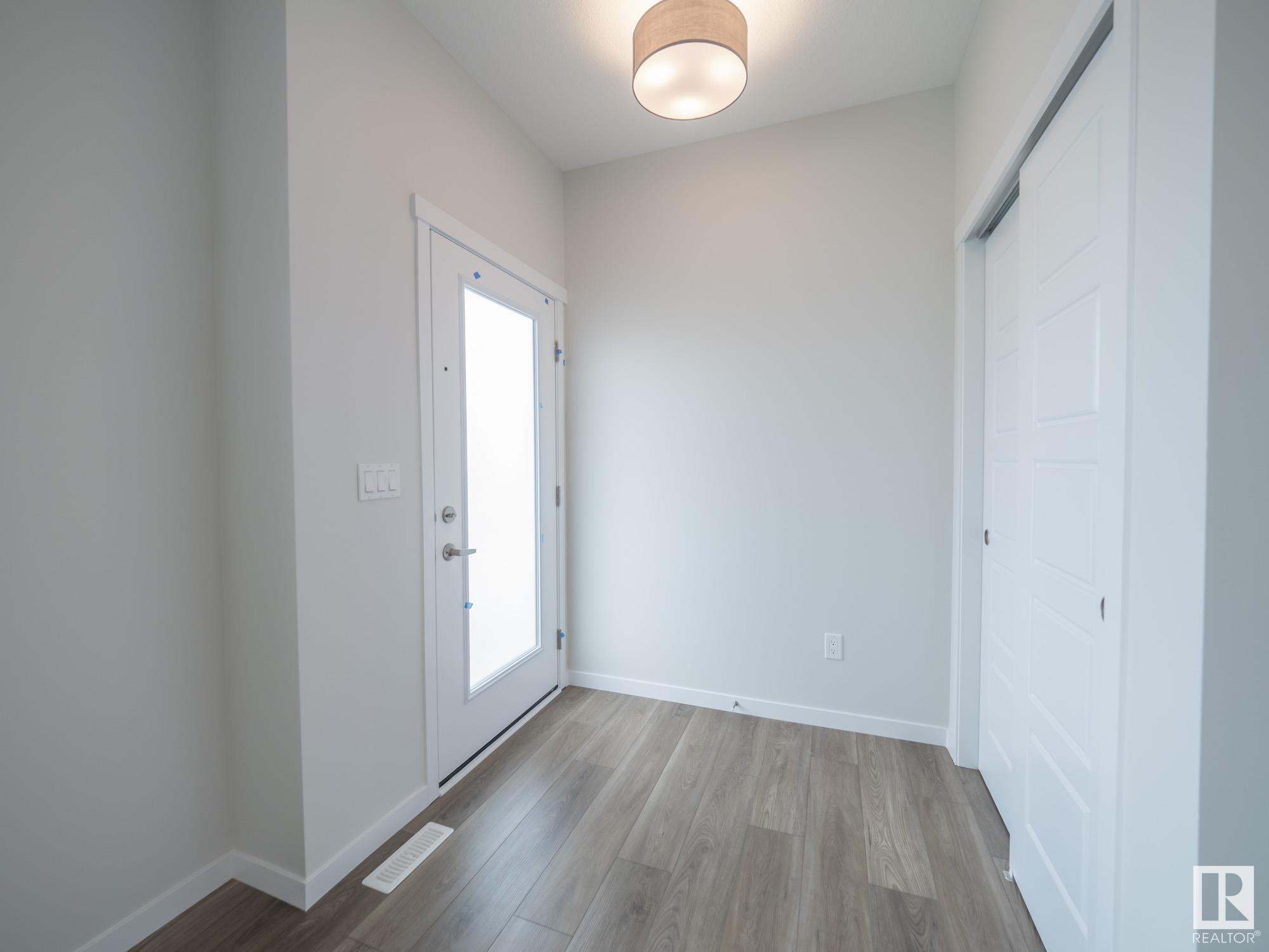 Property Photo:  604 174 Avenue NE  AB T5Y 4G1 