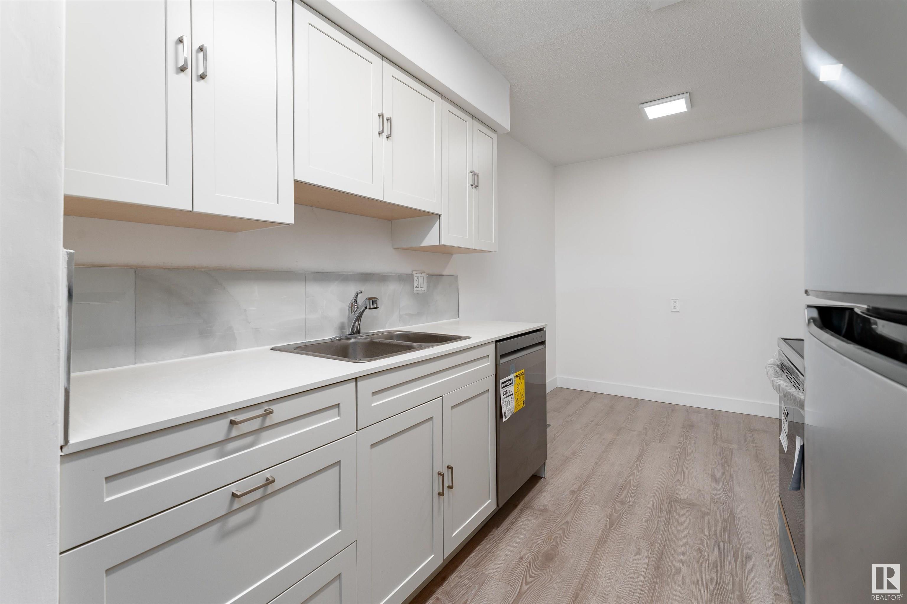 Property Photo:  14230 80 Street NW 8  AB T5C 1L6 