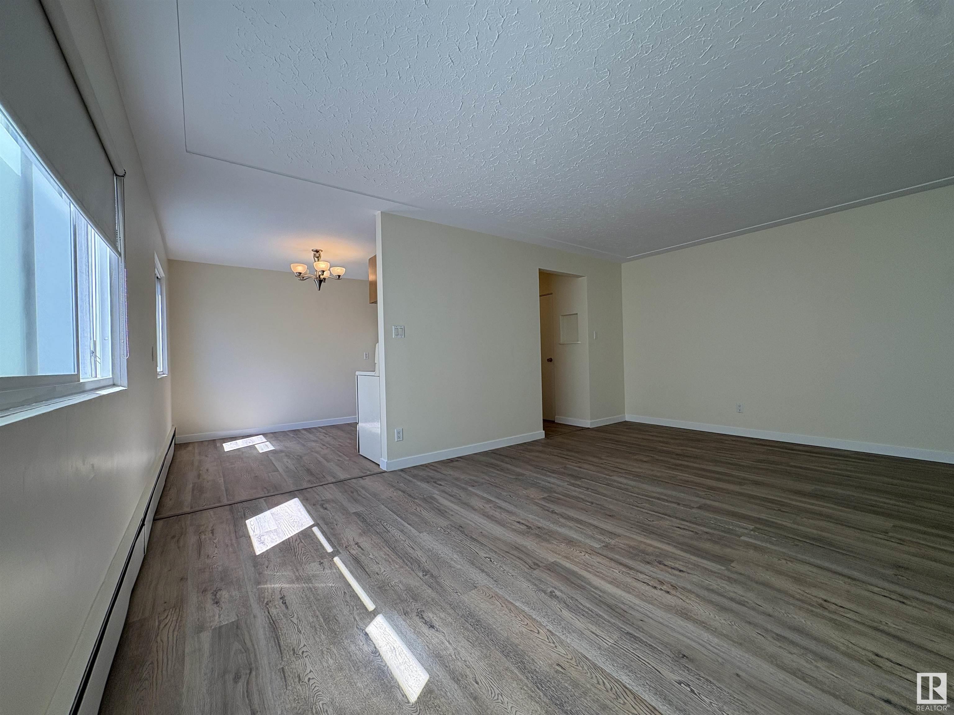 Property Photo:  10625 107 Avenue NW 6  AB T5H 0W5 
