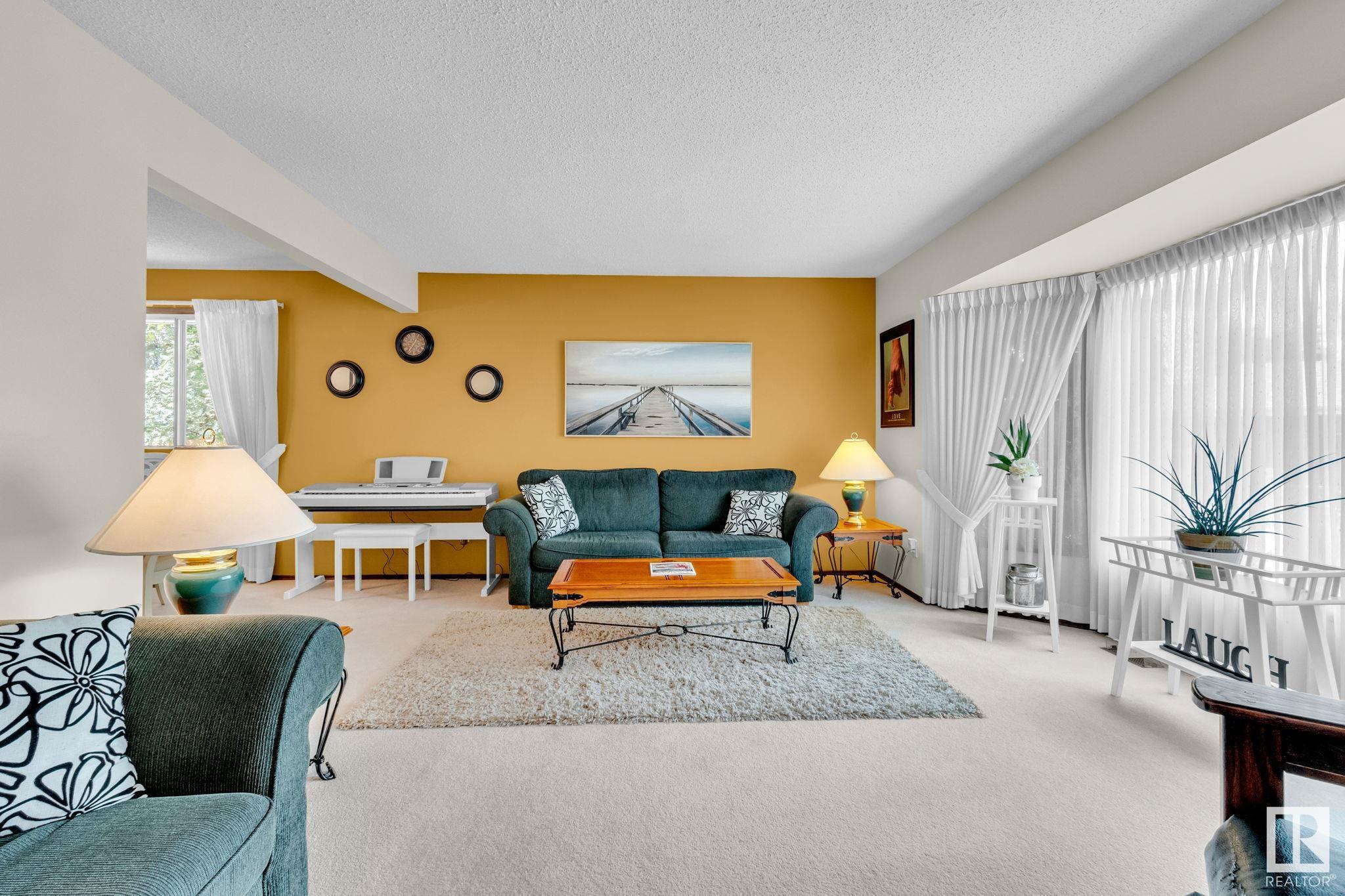 Property Photo: 11739 27 Avenue NW AB T6J 3N7