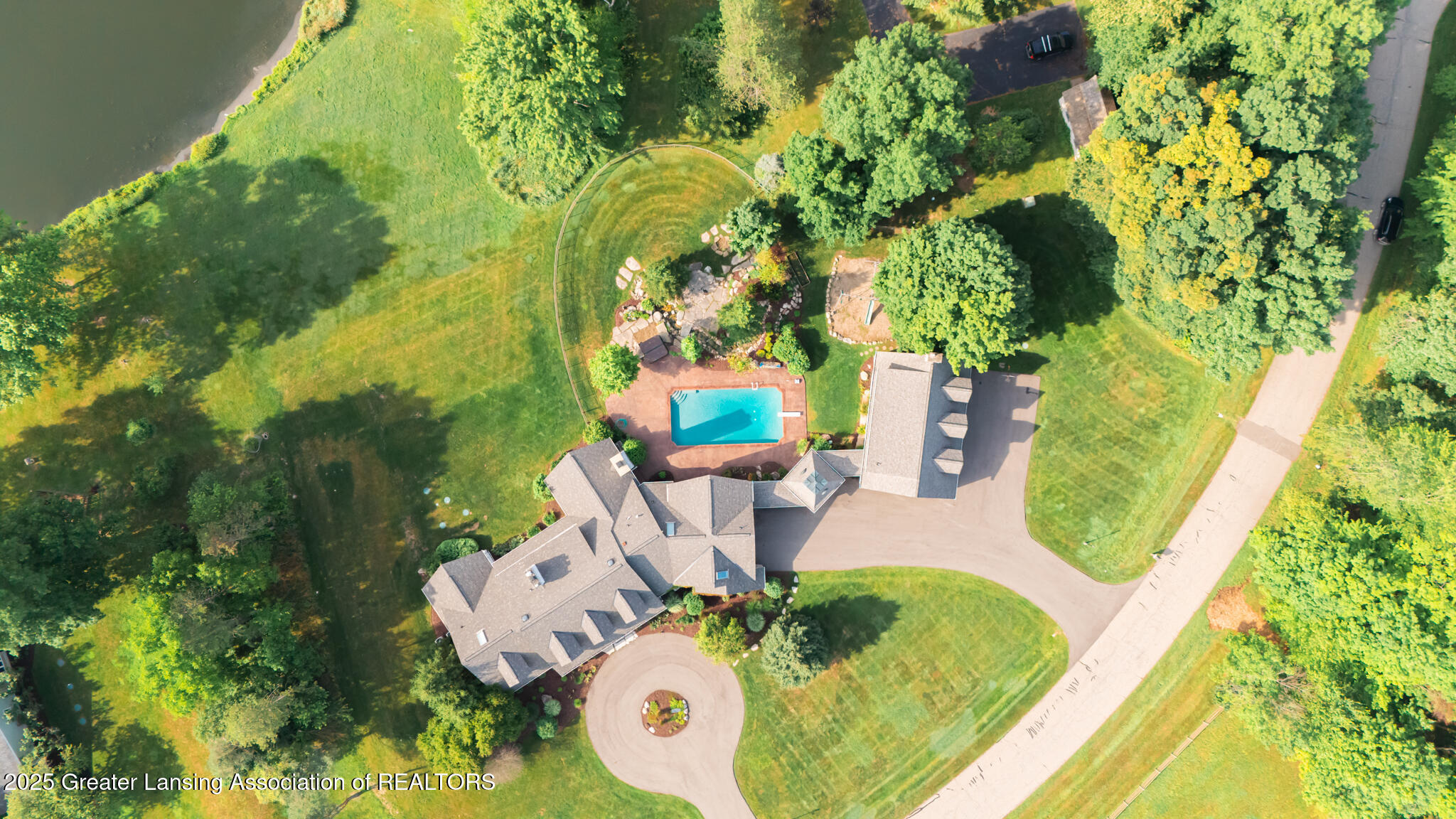 Property Photo:  325 Wind N Wood Drive  MI 48864 