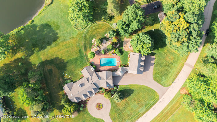 Property Photo:  325 Wind-N-Wood Drive  MI 48864 