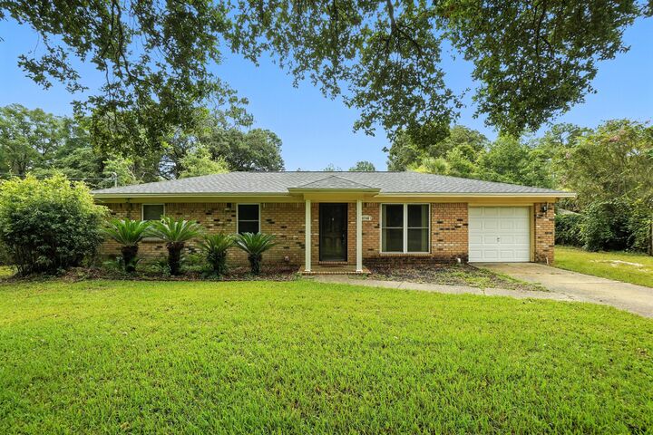 Property Photo:  5746 Jones Street  FL 32570 