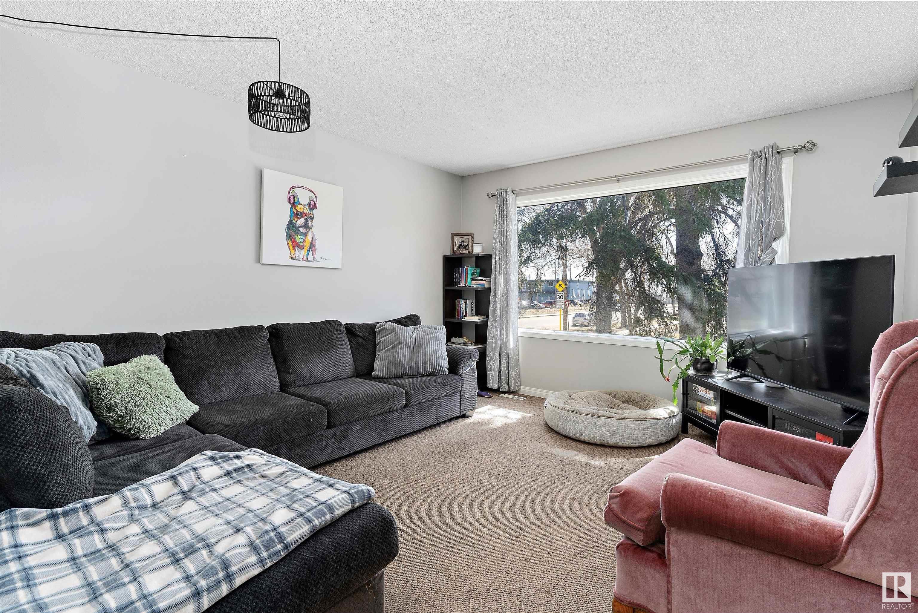Property Photo:  12004 & 12006 128 Avenue NW  AB T5E 6J5 