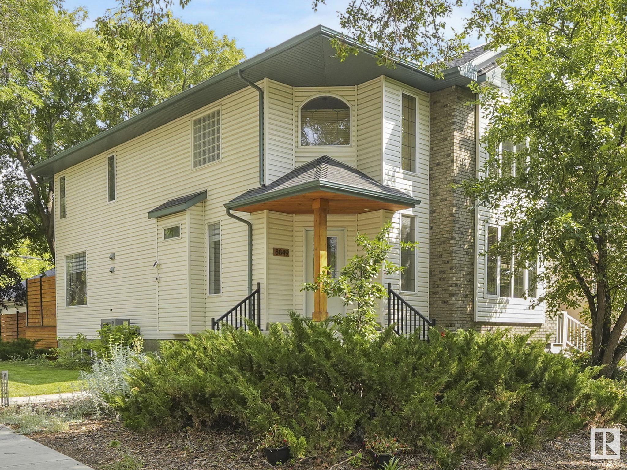 Property Photo:  8849 91 Street NW  AB T6C 3N3 