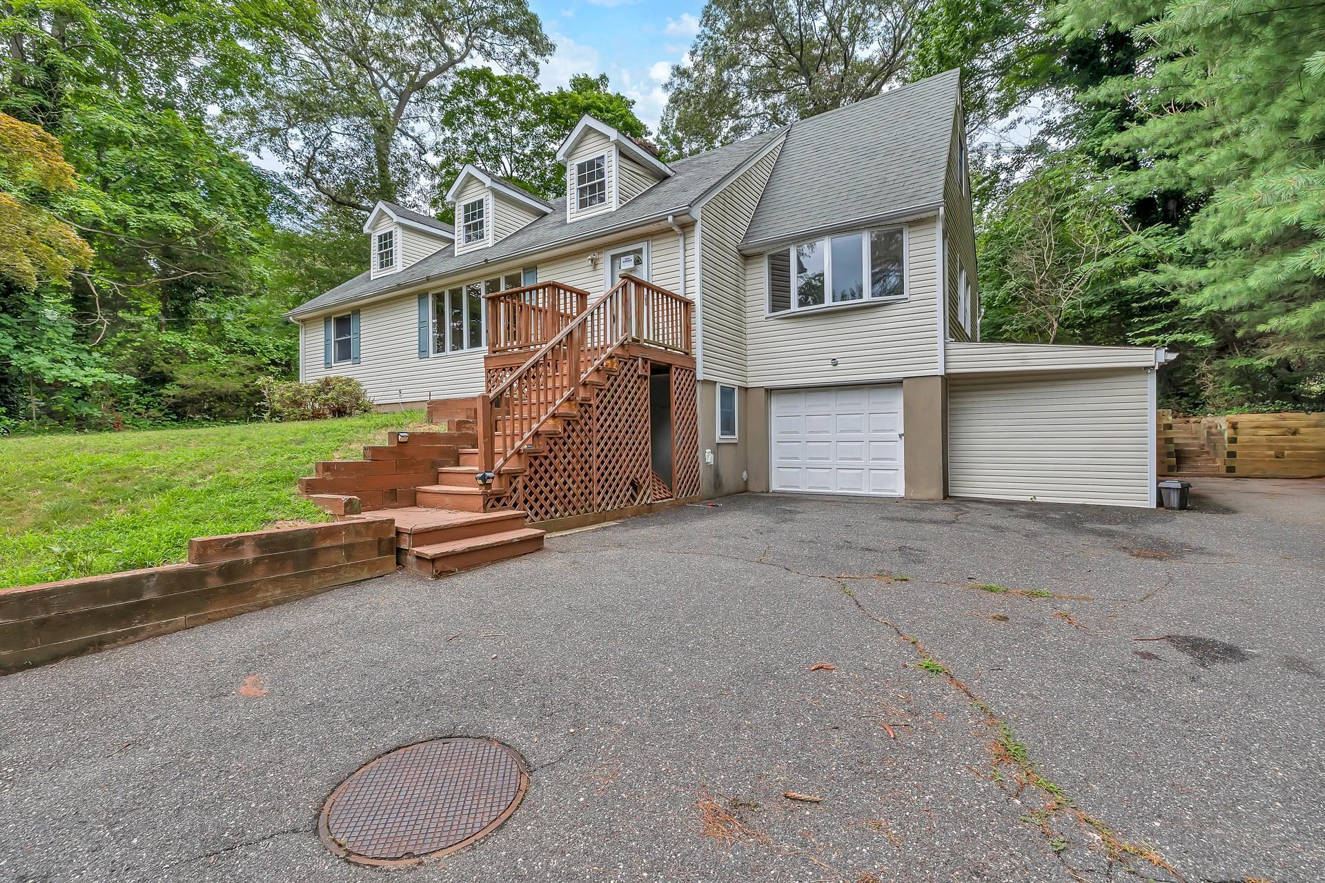 Property Photo: 297 Woodbury Road NY 11743