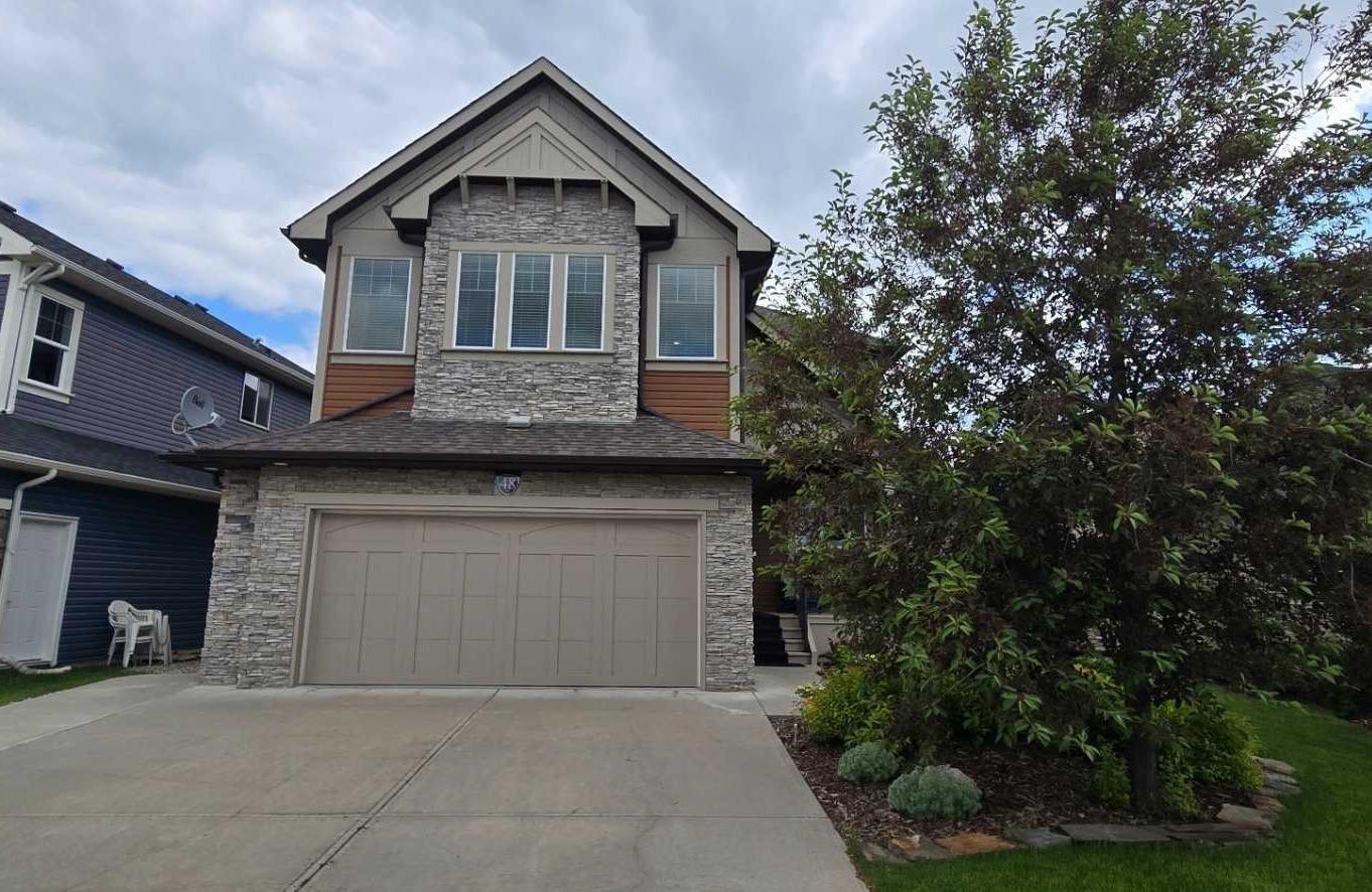 Property Photo:  48 Jumping Pound Terrace  AB T4K 0K3 