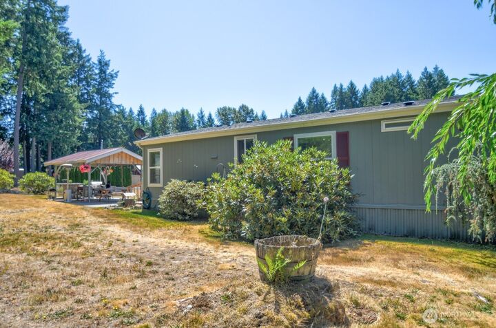 Property Photo:  930  Tipsoo Loop N  WA 98576 