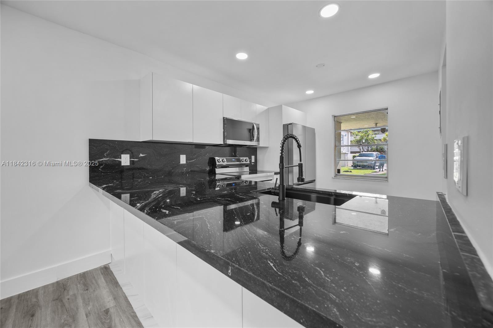 Property Photo:  5790 Stirling Rd 112  FL 33021 