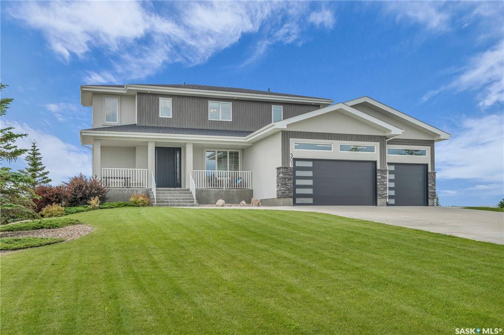 Property Photo:  301 Spruce Creek Crescent  SK S4L 5B1 