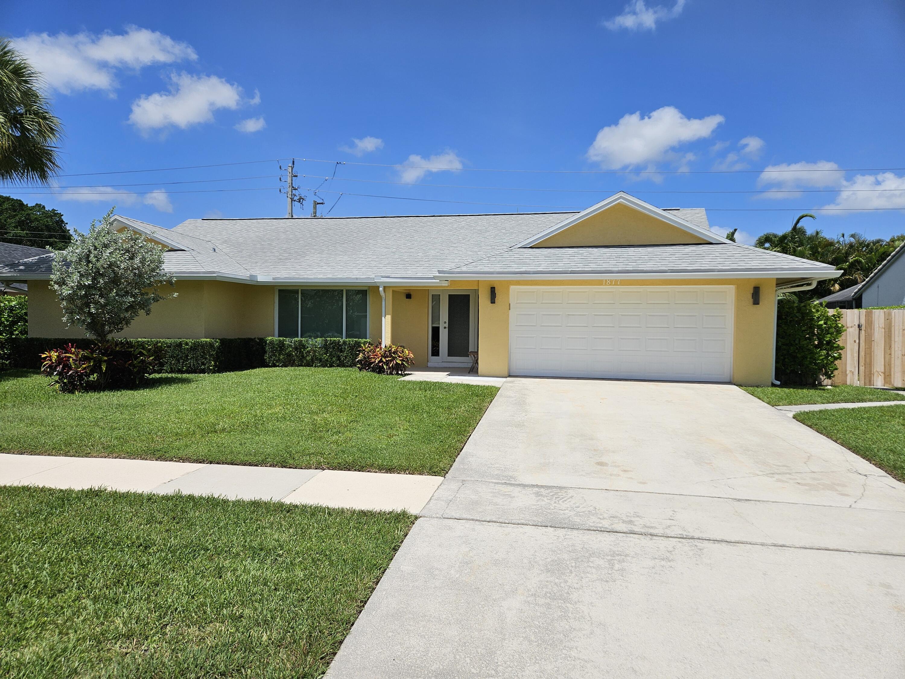 Property Photo:  1877 Shower Tree Way  FL 33414 