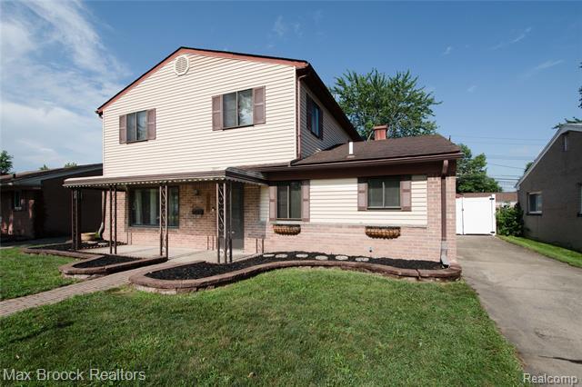 Property Photo:  8212 Carrousel Boulevard  MI 48185 