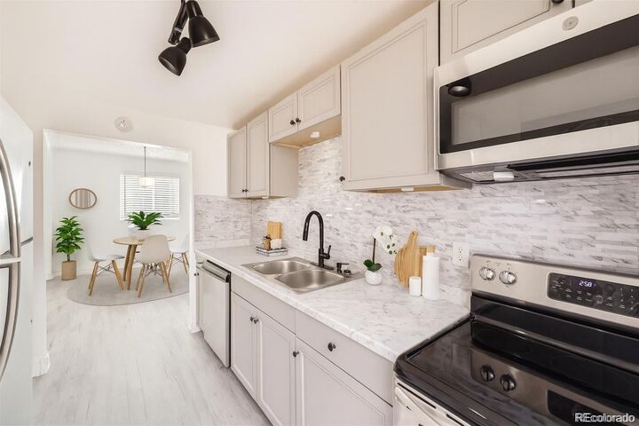 Property Photo:  1537 Xenia Street  CO 80220 