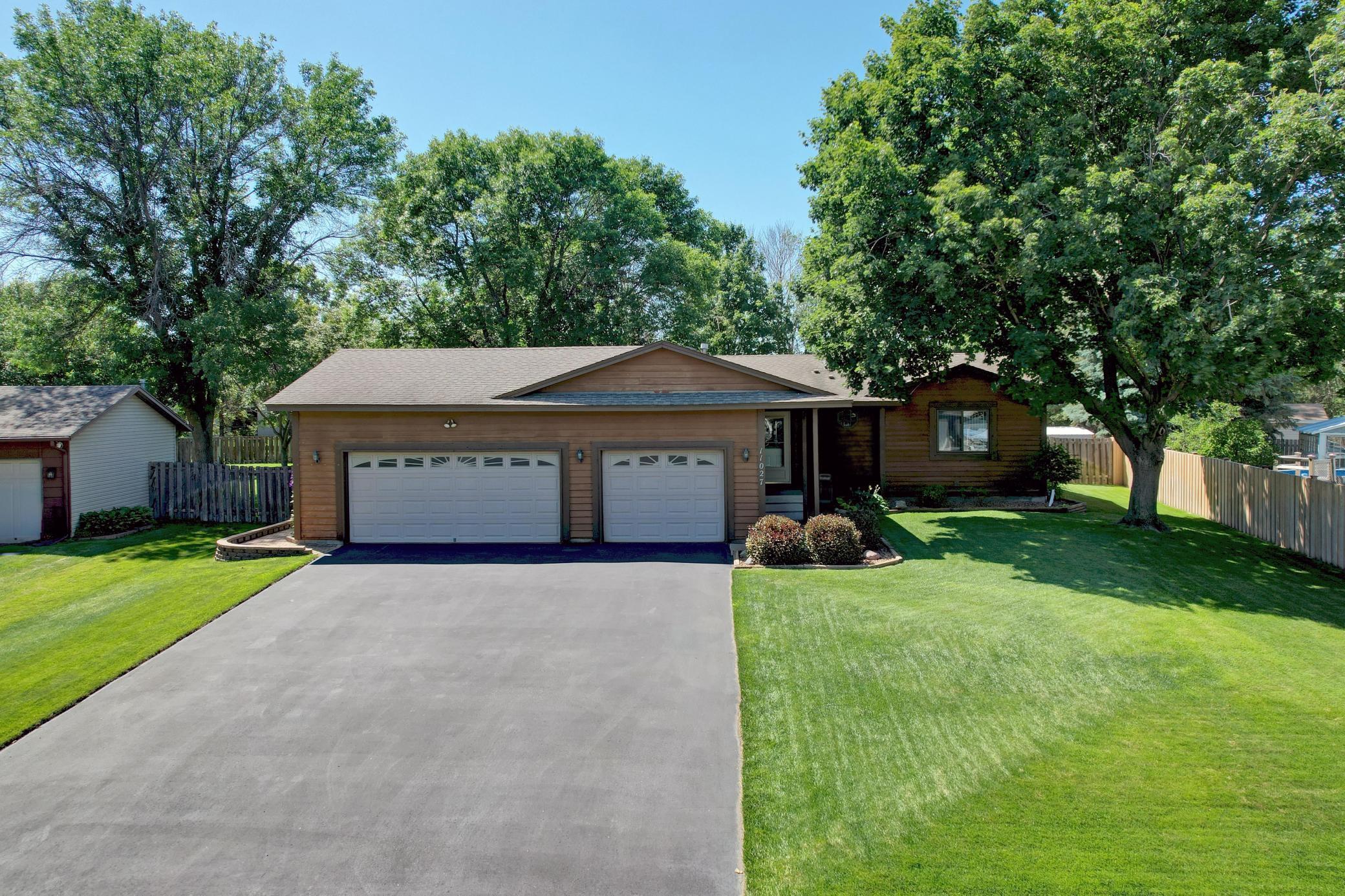 Property Photo: 11027 Xylon Avenue N MN 55316