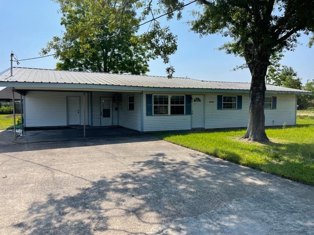 Property Photo: 4923 Country Club Court LA 70605