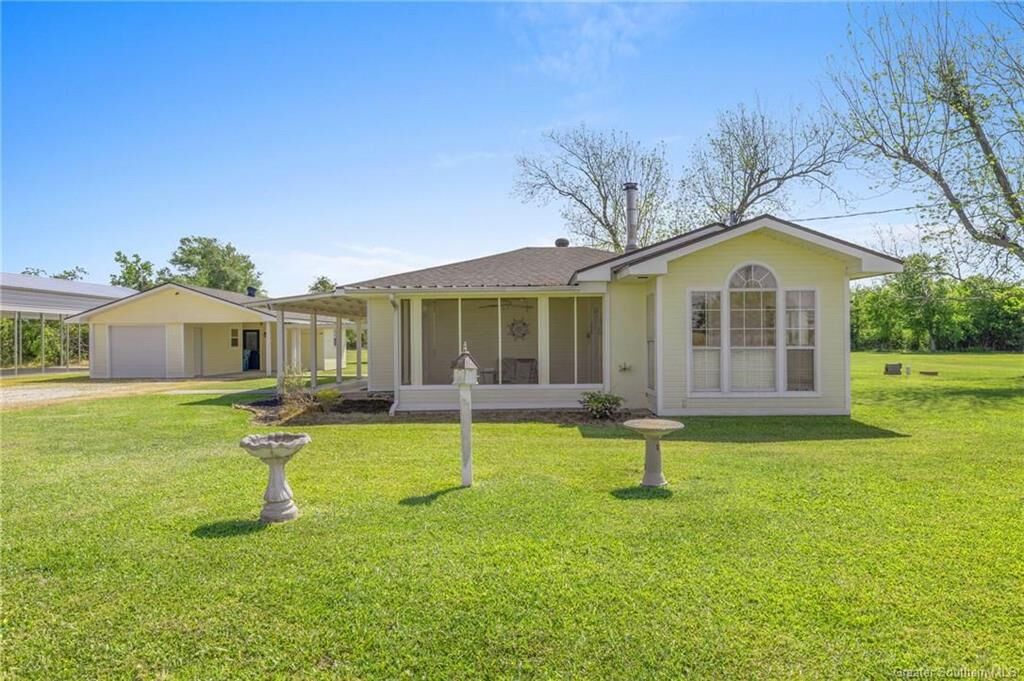 Property Photo:  8705 Tom Hebert Road  LA 70607 