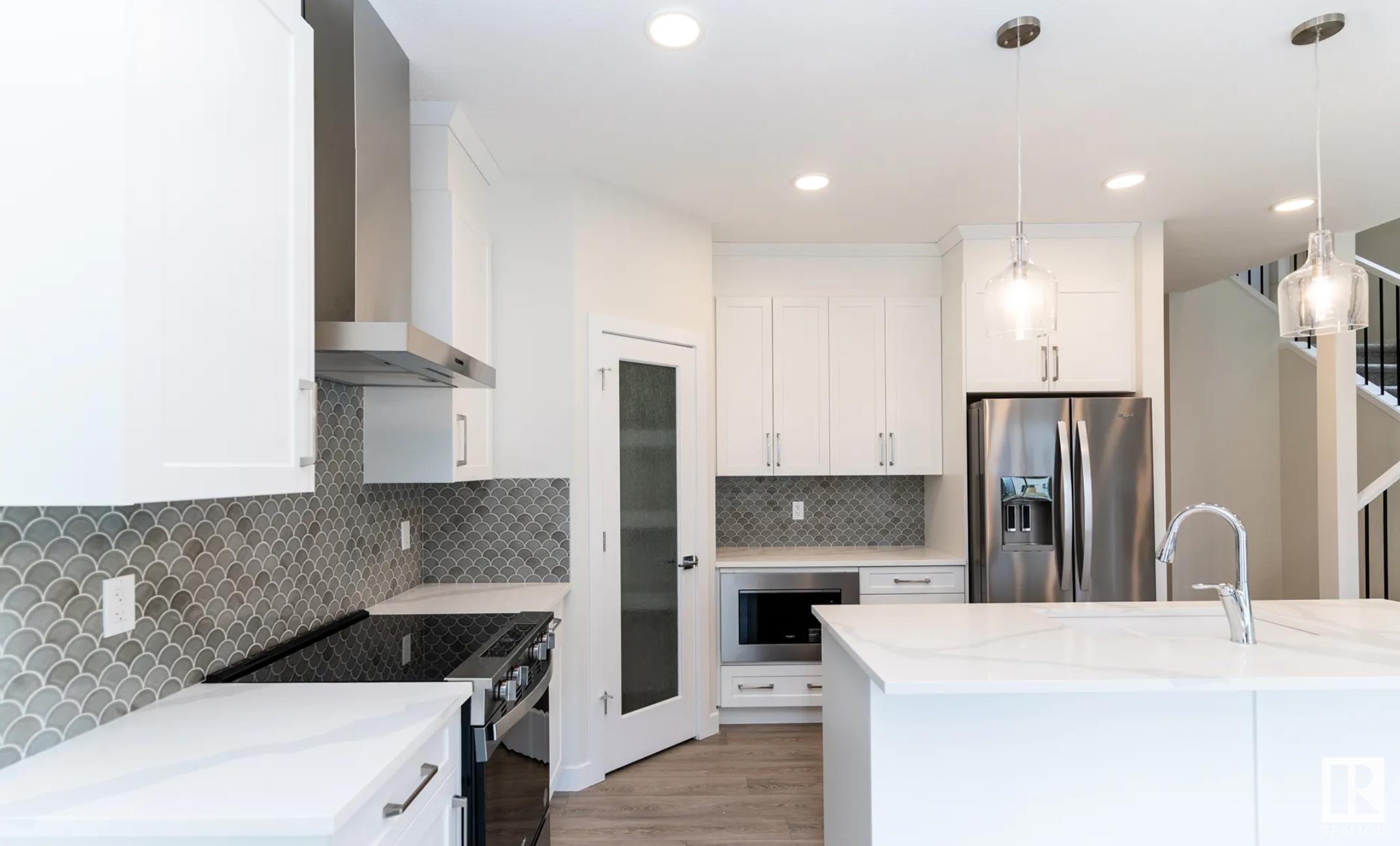 Property Photo: 3216 Dixon Way SW AB T6W 5L3
