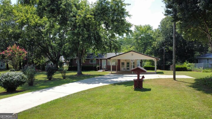 Property Photo:  7177 Capps Ferry Road Road  GA 30135 