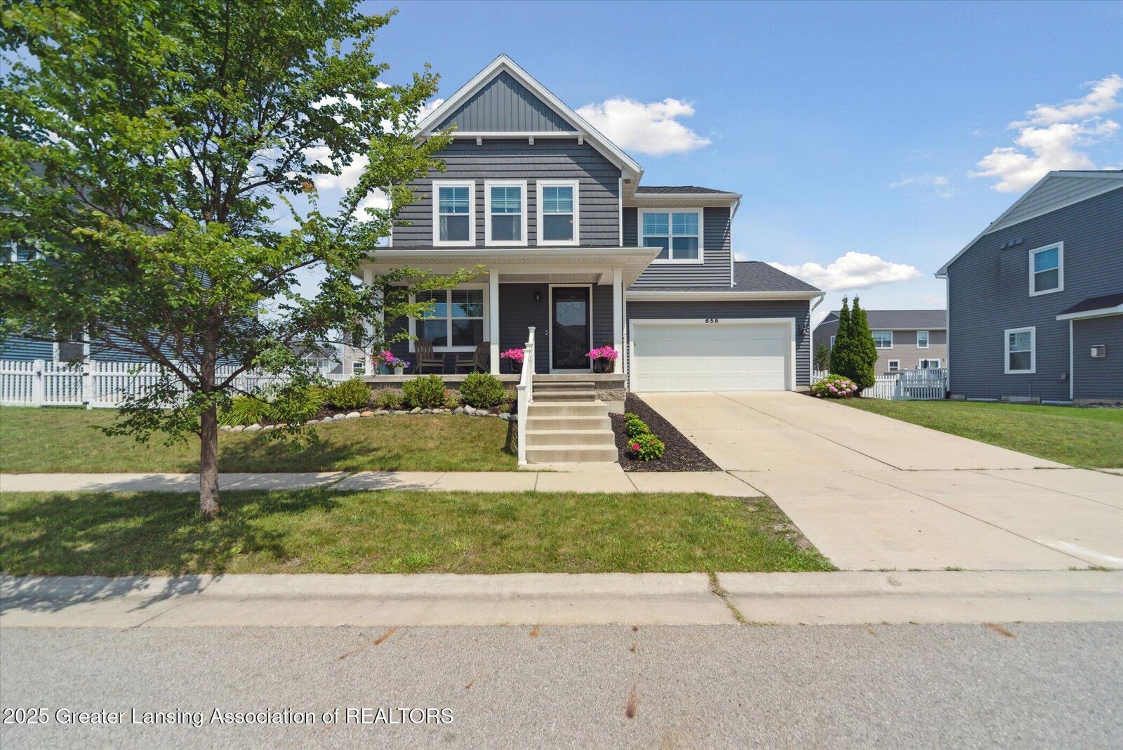 Property Photo:  658 Accipiter Way  MI 48823 
