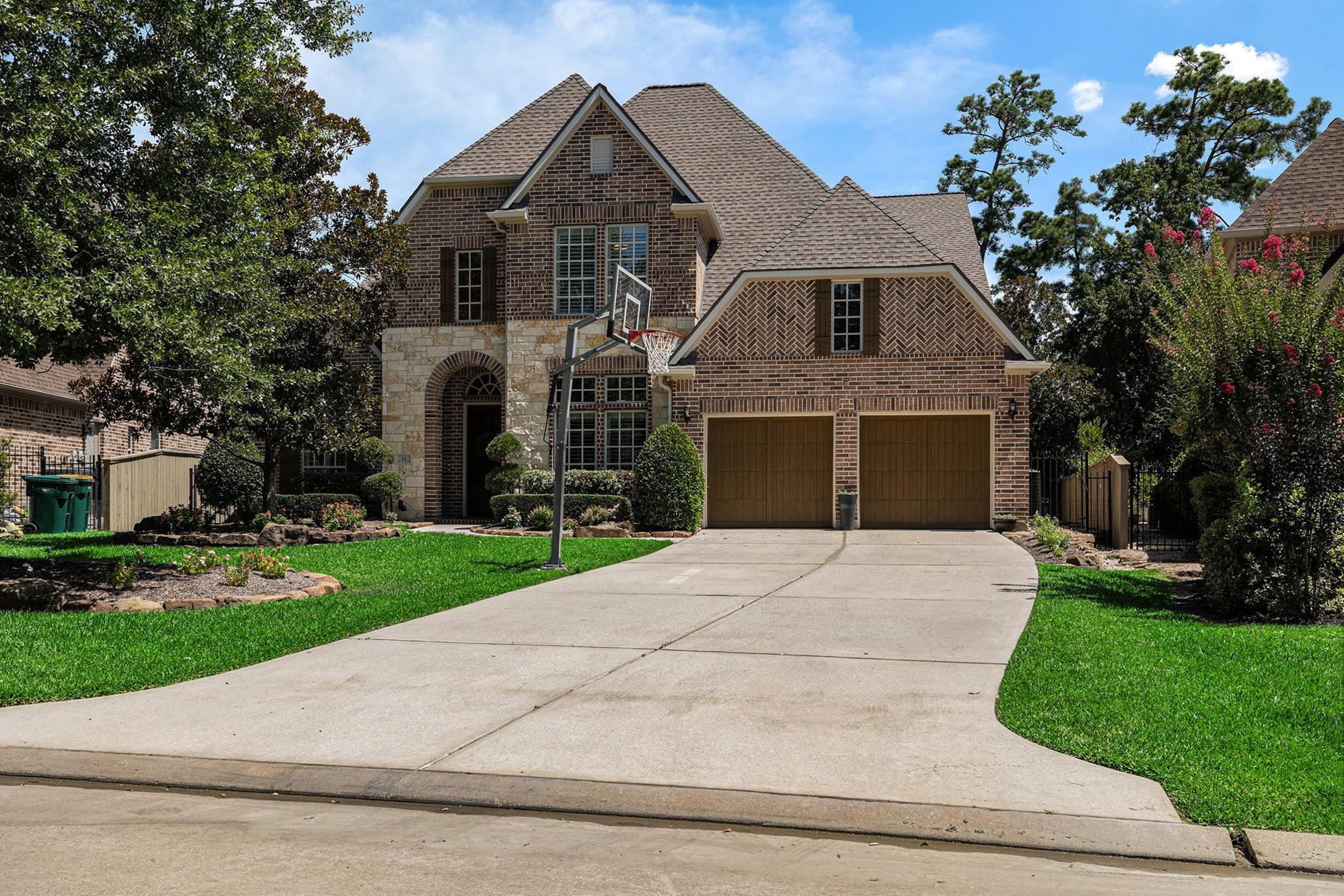 Property Photo:  31 Wood Manor Place  TX 77381 