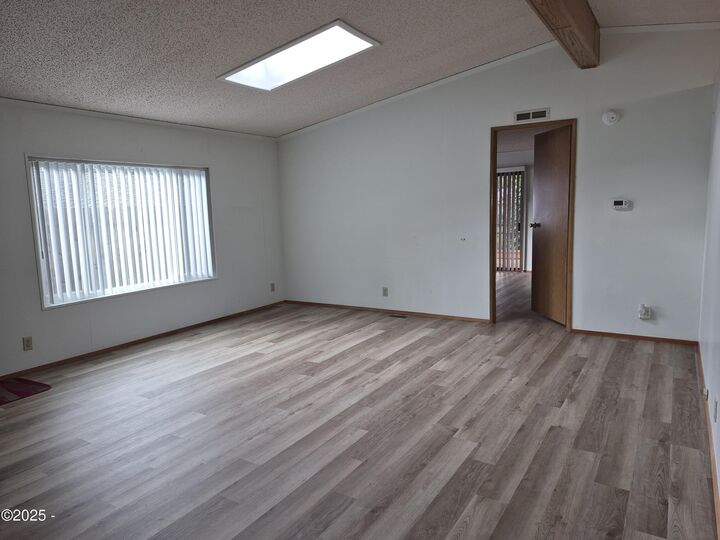Property Photo:  211 NE 70th Street  OR 97365 
