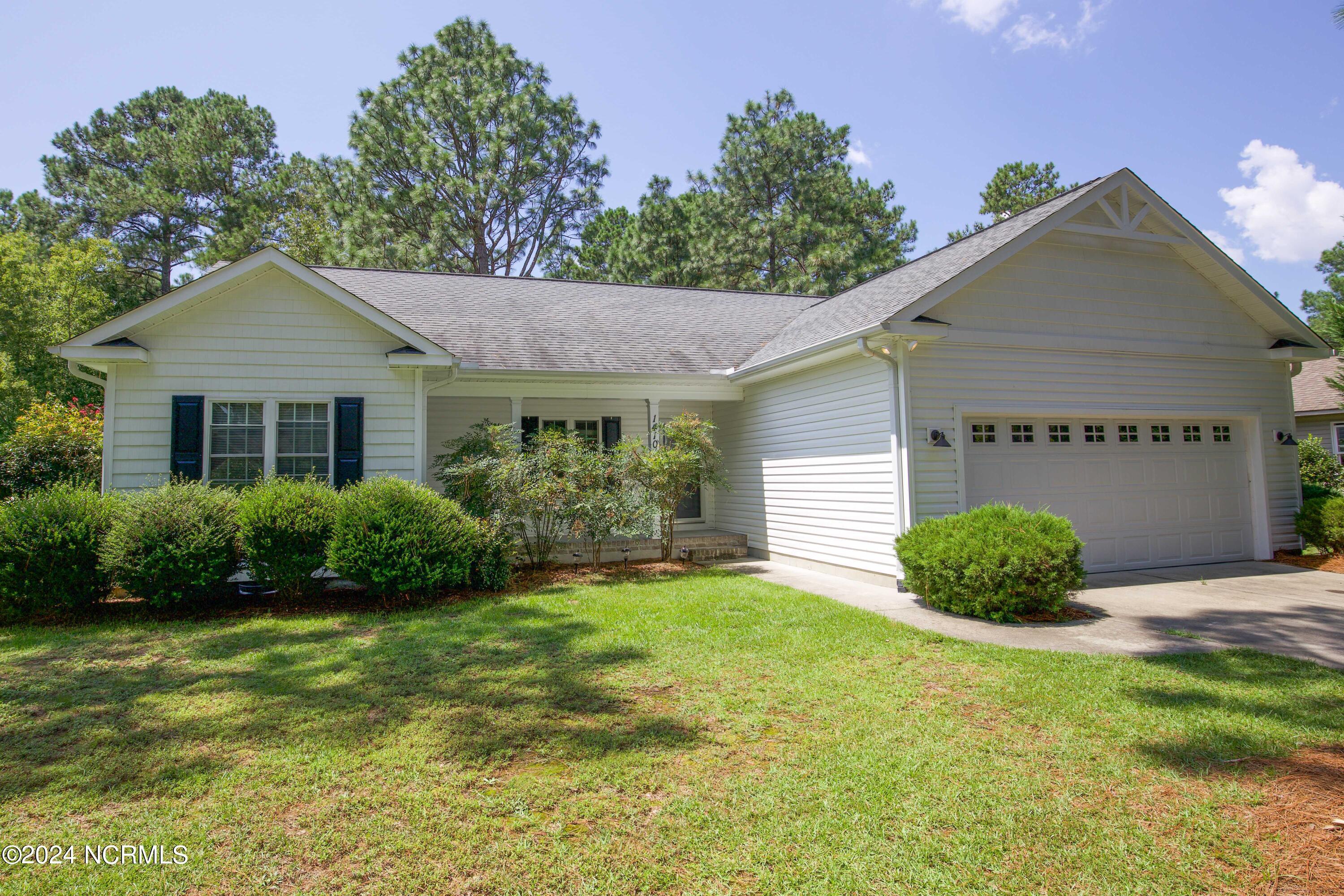 Property Photo: 1410 Longleaf Drive E NC 28374